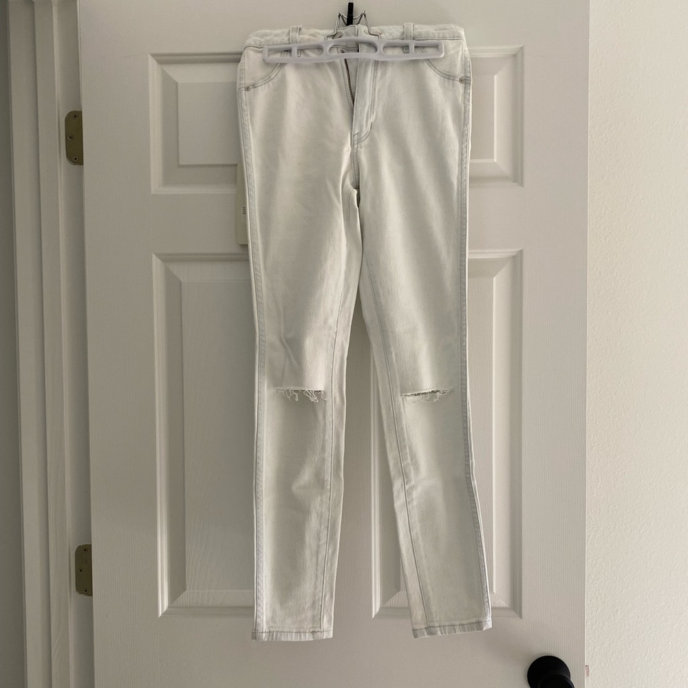 Rolla’s whitewashed distressed skinny jeans